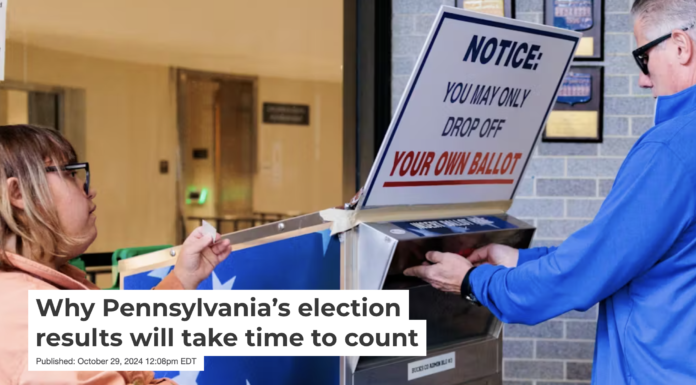 John Zapf drops off a mail-in ballot on Oct. 15, 2024, in Doylestown, Pa. Hannah Beier/Getty Images